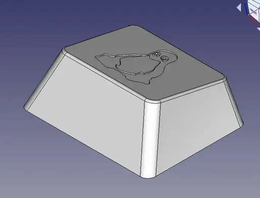 A 3d-model of a Tux keycap.